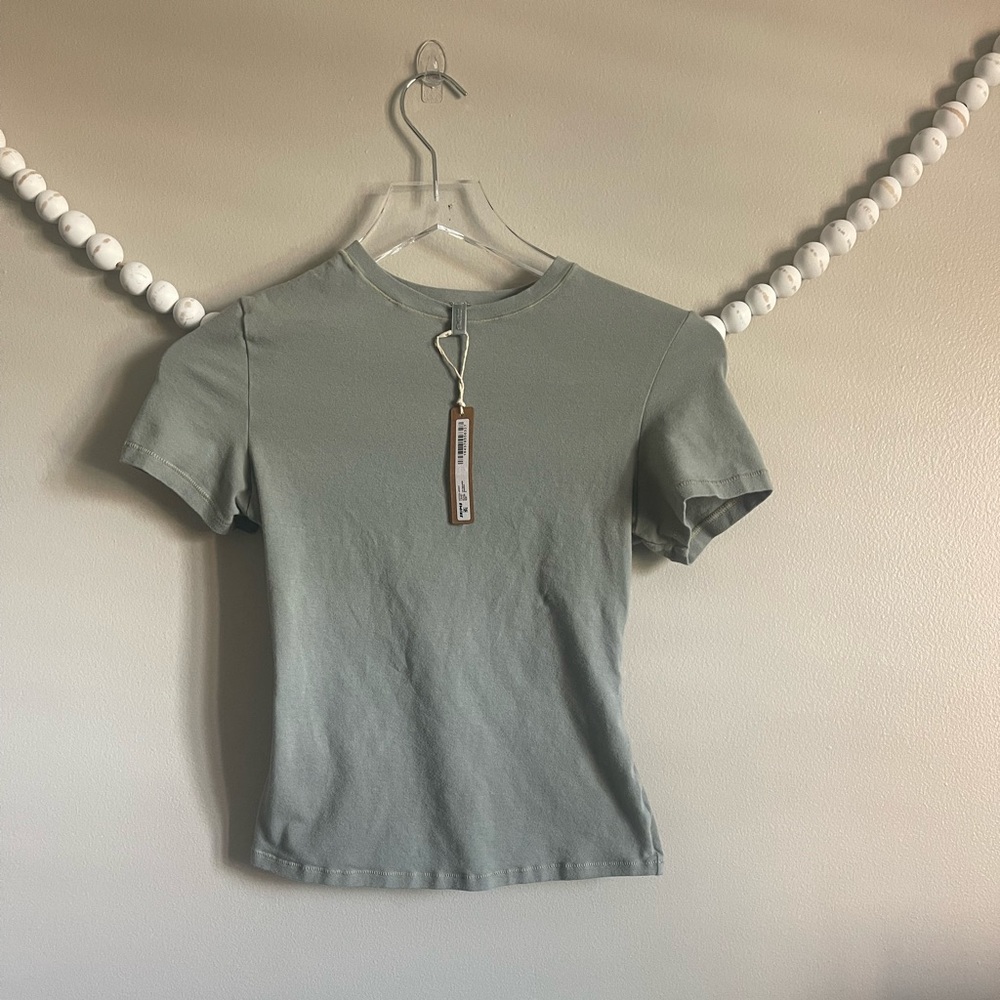 NWT!! Skims Cotton Jersey Tee in the color Mineral size Small